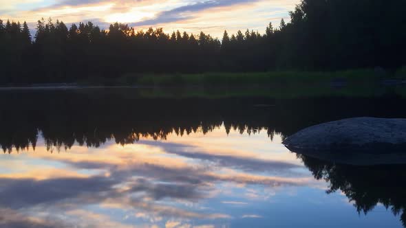 sunrise reflected in water in Scandinavia