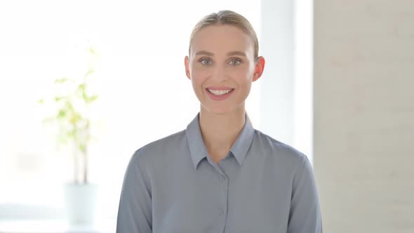 Portrait of Woman Smiling at Camera