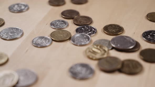 panoramic shooting of coins lying on the table