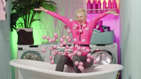 Pink Balloons are Falling on Happy Woman in Pink Swimsuit or Overalls Slow Motion Video