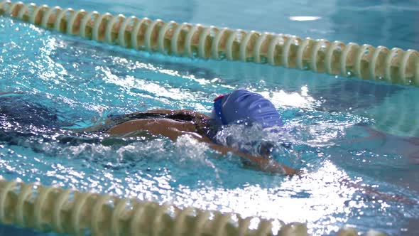 Swimmer training in a swimming pool