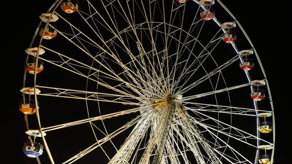 CAEN, FRANCE - FEBRUARY  2016 Relaxing spin scene of Christmas roundabout lights and detailed struct