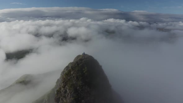 Aerial view of a person standing on Le Pouce Mountain, Mauritius.