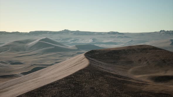 Aerial View on Big Sand Dunes in Sahara Desert at Sunrise alt