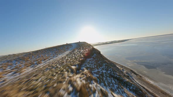 Plateau on the West Coast Beach and Sun Shining Brightly Against Blue Sky