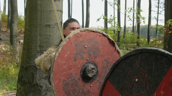 Warriors fighting in a forest