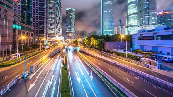 Timelapse of busy traffic road with modern office building in Shanghai china