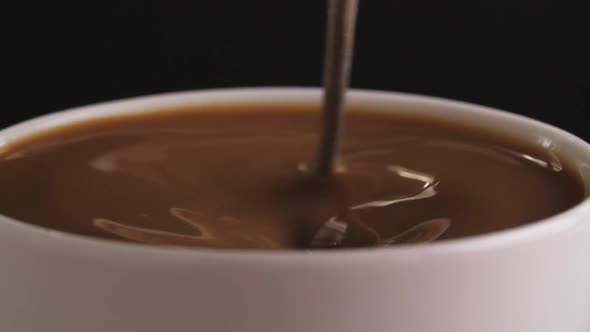 Stirring Coffee 