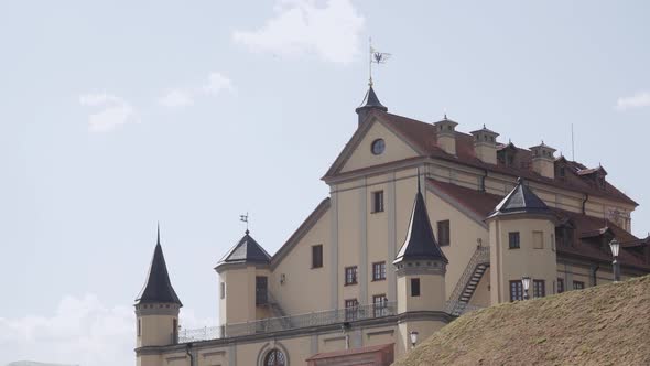 Renovated Old Architectural Palace with Towers in Sunny Weather