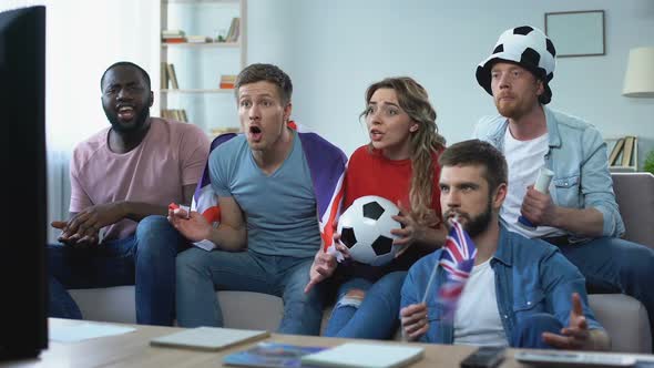 British Friends Watching Football Game on Tv, Rejoicing Goal of National Team