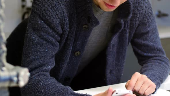 Man using digital tablet and mobile phone