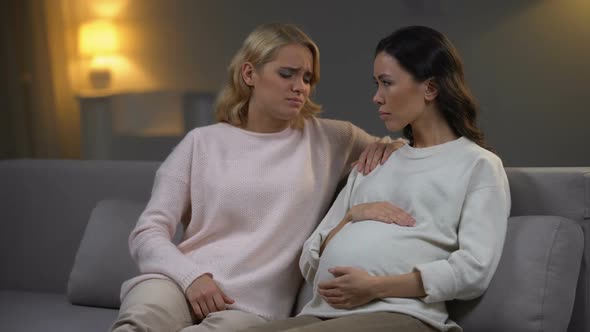 Woman Support Upset Pregnant Friend Feeling Bad and Worrying About Baby Health