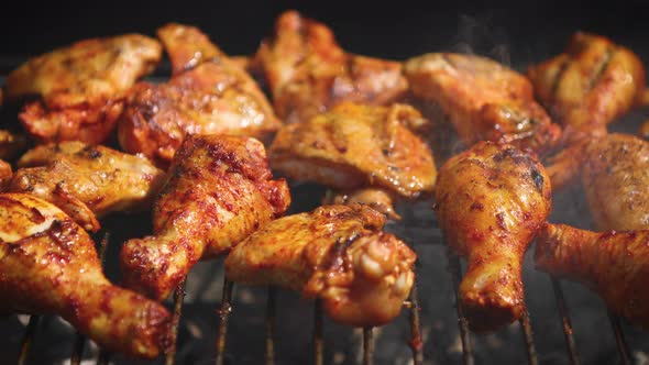 Delicious Chicken Pieces Frying on Barbecue Grill