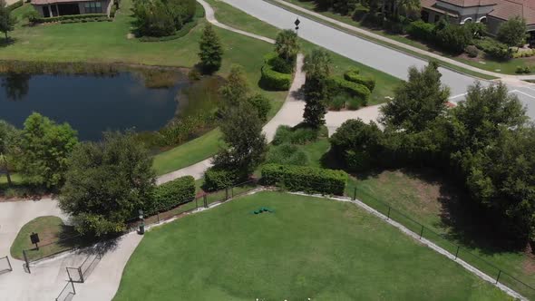 Beautiful neighborhood dog park (drone/aerial)