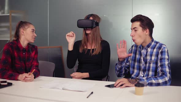 Creative Computer Science Students in Modern Office Wearing Vr Headset and Using Vr Application
