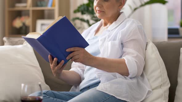 Senior Woman Reading Book at Home 25