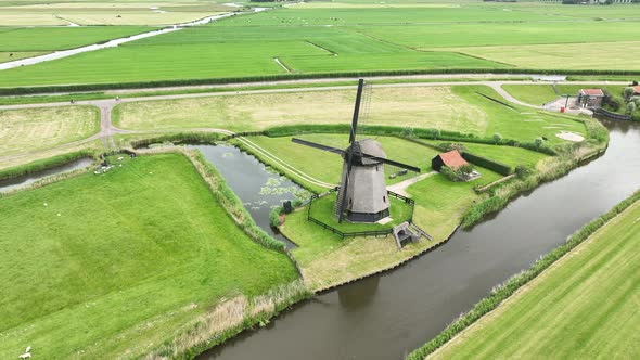 Idyllic Old Dutch Historic Traditional Windmill Aerial Drone Overhead Overview