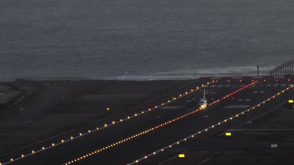 The Plane Departs From the Airport on the Island