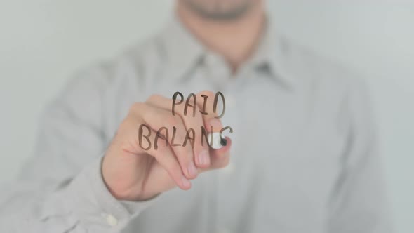 Paid Balance Writing on Screen with Hand