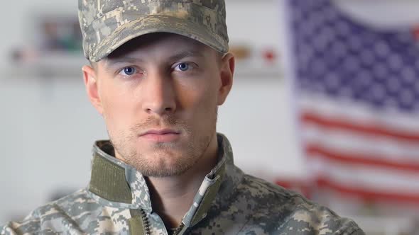 Confident Serviceman Looking Camera, National Flag on Background, American Army