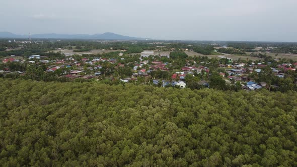 Aerial move toward Malays kampung