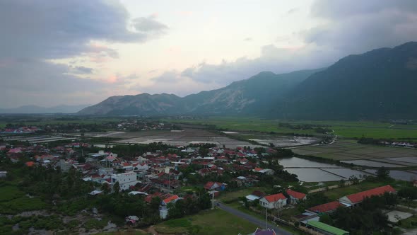 Epic Aerial View Of Tuy Hòa With Mountains And Shrimp Farms.