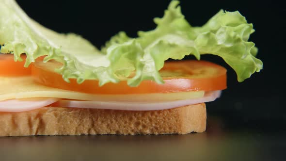 Falling Of Ingredients On A Sandwich