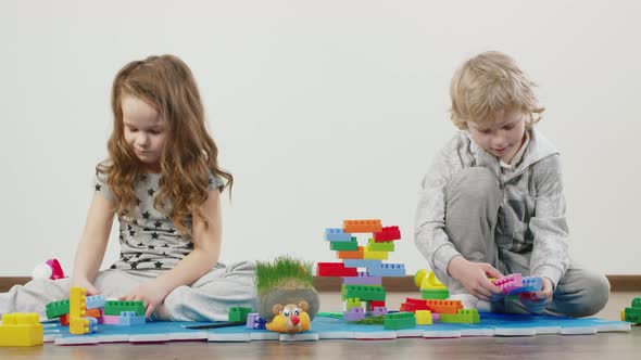 Young Brother And Sister Play Together