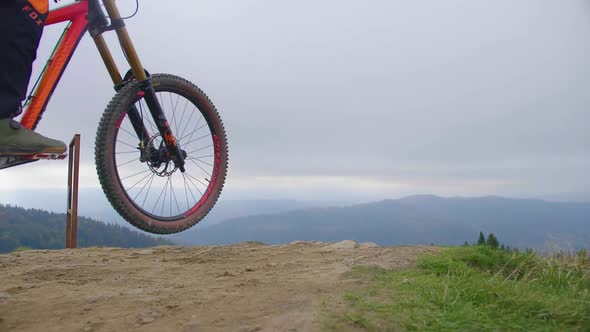 Cyclist Rides in the Mountains