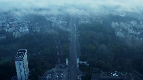 High Angle View of Wide Street and Railway Track Leading Through Town