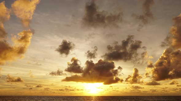 Time lapse sunset in the clouds