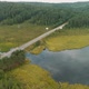 Beautiful Aerial View of Green Forest and Road in Countryside on Summer Day - VideoHive Item for Sale