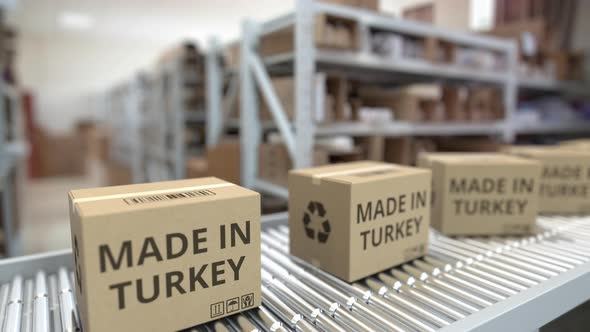 Boxes with MADE IN TURKEY Text on Warehouse Conveyor