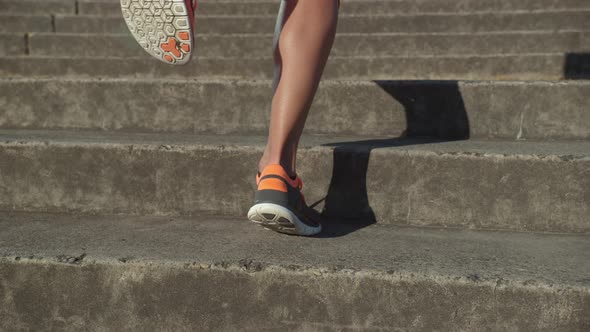 Closeup slow motion shot of woman running, shot on Phantom Flex 4K alt