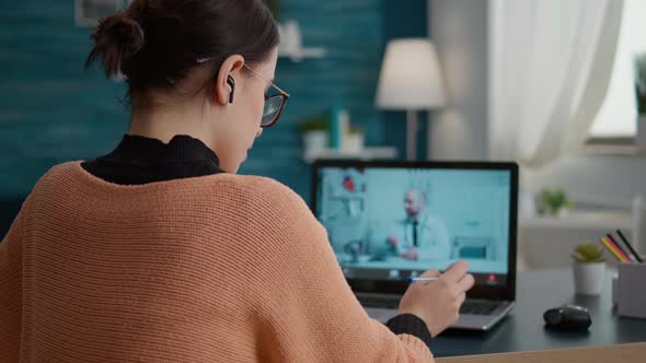 Female Patient Meeting with Doctor on Online Video Call