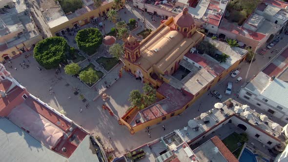 San Sebastian's Temple And The Main Plaza In Bernal, Querétaro, Mexico - aerial drone shot
