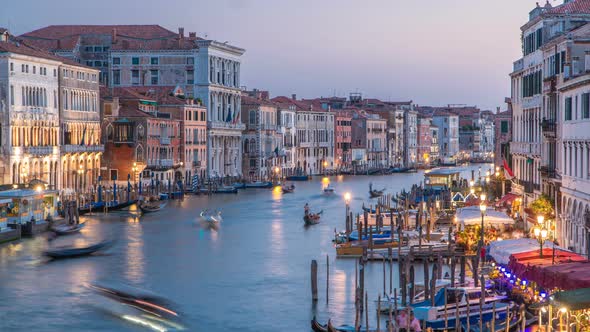 Grand Canal in Venice, Italy Day To Night Timelapse. View on Gondolas and City Lights From Rialto