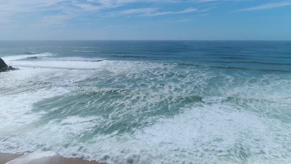 Waves Drop to Sand Sea Shore Aerial