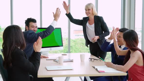 Business People in the Conference Room with Green Screen