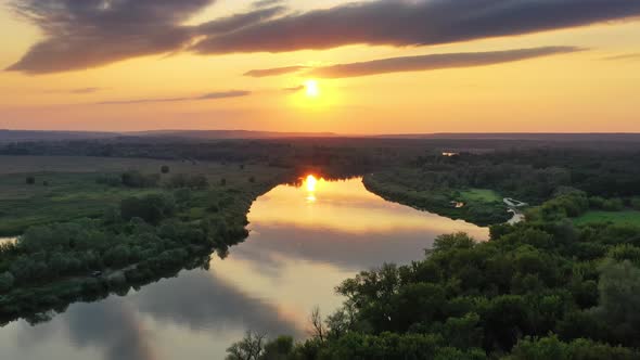 Sunrise or Sunset with Forest and River