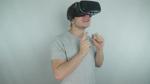 Young Man Uses Virtual Reality Technology