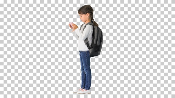 School girl with backpack watching something, Alpha Channel