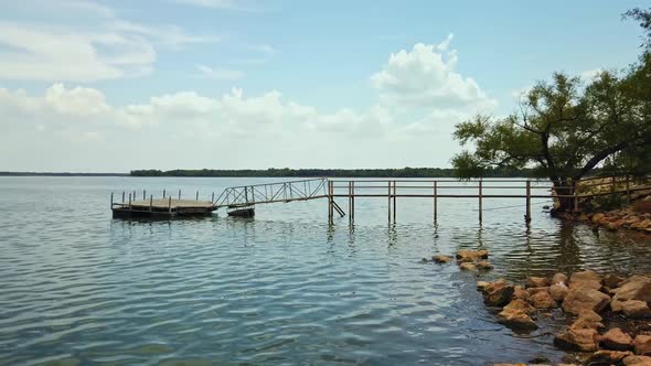 A slow pan shot of a boat ramp