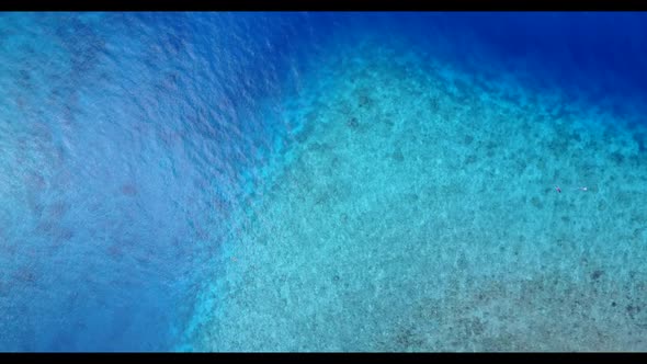 Aerial top view abstract of perfect tourist beach wildlife by blue water with white sandy background