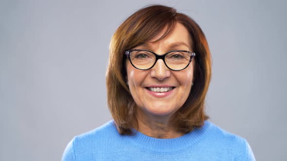 Portrait of Happy Senior Woman in Glasses 2