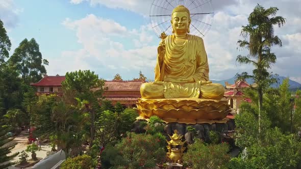 Golden Buddha Statue Against Pagodas Beautiful Sky