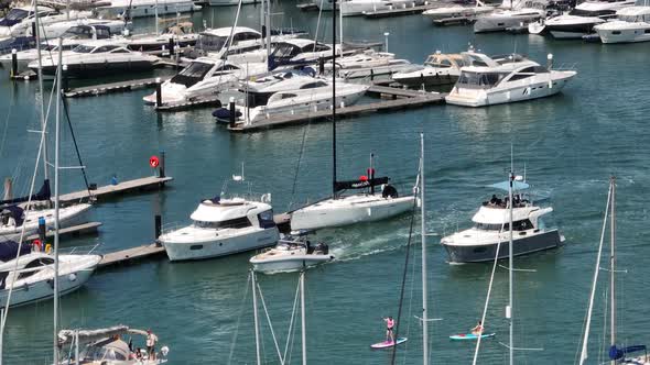 Yachts, Speedboats and Vessels on a River in the Summer