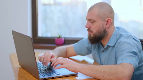 Closeup Boring Business Man Looking Computer Screen at Home Office