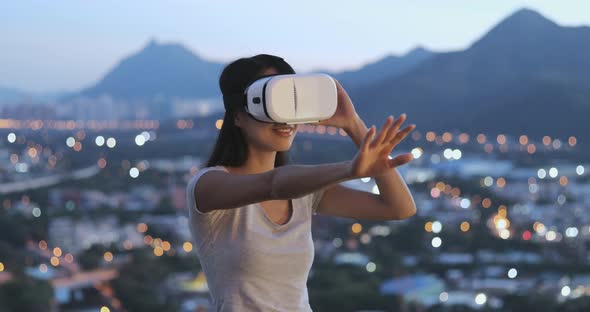 Woman watching with VR device 