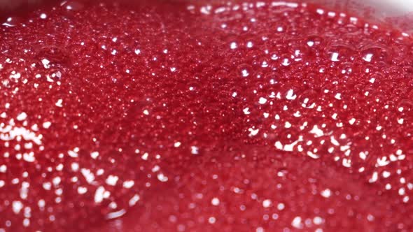 Red Bubbles Rise in a Thick Liquid